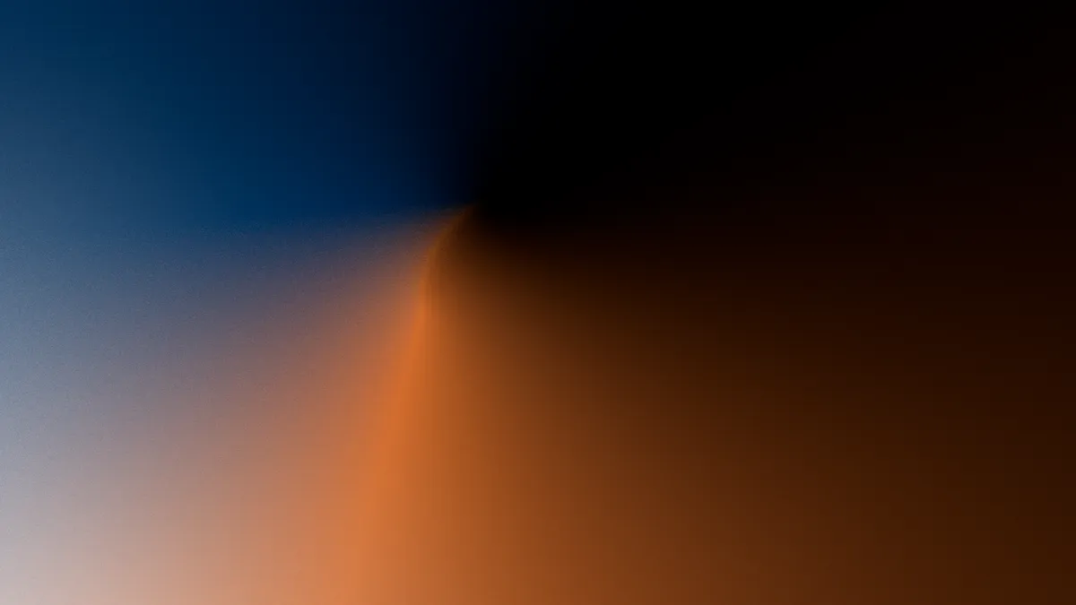 Midnight Flame. The signature gradient: Midnight Blue into Royal Orange.
